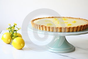 tarte au citron with a glossy, clear glaze, reflective shine