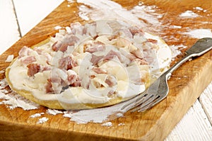 Tarte flambee with onion and bacon