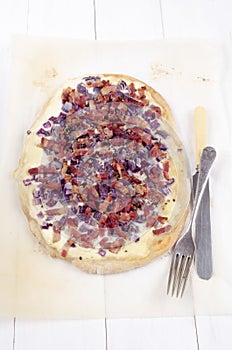 Tarte flambee with onion and bacon