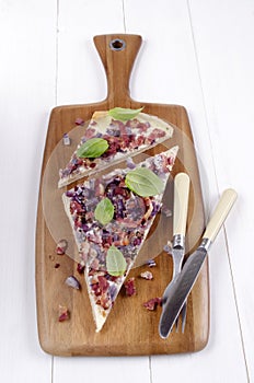 Tarte flambee with onion, basil and bacon