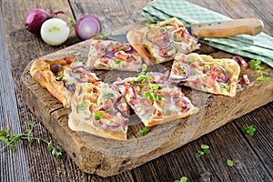 Tarte flambee with onions and bacon