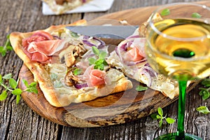 Tarte flambee with wine photo