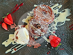 Tarte Tatin with icecream and strawberries