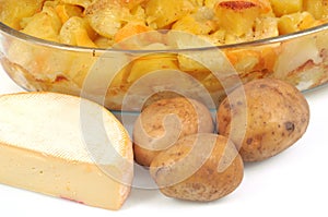 Tartiflette in a dish with its ingredients