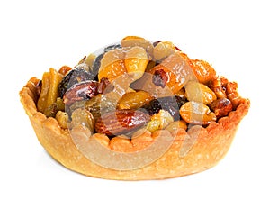 Tartlet with dried fruit, cake isolated on white