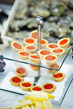 Tartlets with red caviar