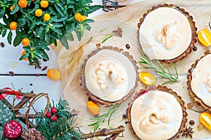 Tartlets with Whipped Cream, Raspberries and Lemon Jam on Light White Wooden Table