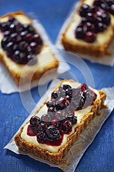 Tarts with custard and blueberries photo