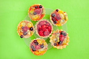 Tarts with strawberry and other fruits and berries