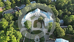Tartu Old Anatomical Theatre. Colonial style city. Aerial Drone fly. Flying
