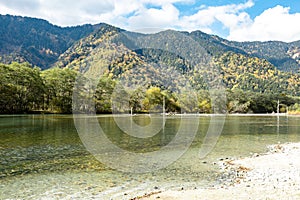 Tashiro Pond, one of Kamikochi`s most scenic spots, is a small pond surrounded by marshland. Photo during October 2023 on fall fol