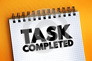 Task Completed text on notepad, concept background