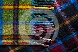 Tasself of plaid,woolen scotch blanket,close-up