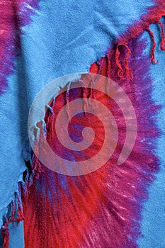 Tassels of tie dye background hanging at angle photo