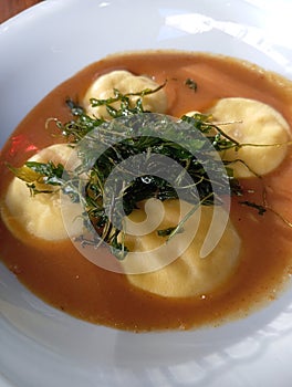 Eating Out Prawns Panciotti With Scampi Bisque photo