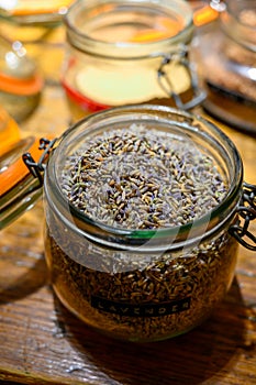 Tastes of gin, botanicals ingredients for gin distillery process, pot with dried English lavender flowers