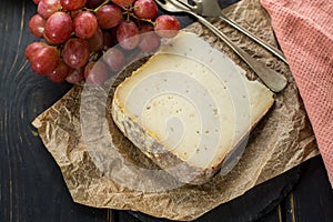 Tasting of ancient french demi soft cheese Tomme from French Alp