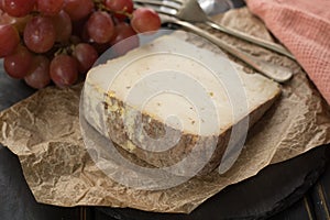 Tasting of ancient french demi soft cheese Tomme from French Alp