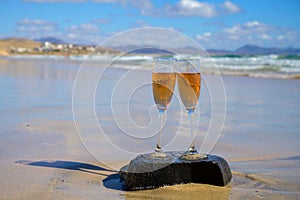 Tasting of brut champagne sparkling wine with view on hilly pinot noir gran cru vineyards of famous champagne houses near Ay and