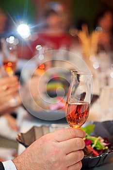 Tasting. cognac in hand in a narrow tasting glass