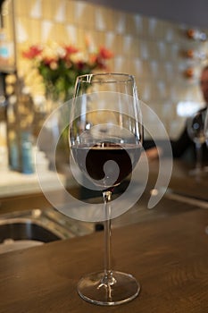 Tasting of dry Spanish tempranillo red wine in Spanish bogeda restaurant photo