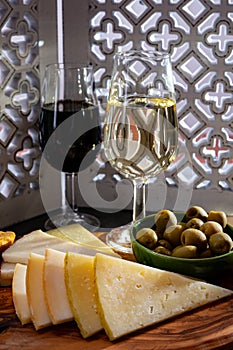 Tasting of fortified Andalusian sherry wine with traditional Spanisch tapas, green olives, goat and sheep manchego cheese