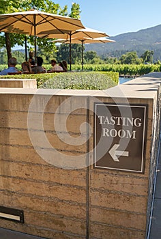 Tasting room sign outside a vineyard