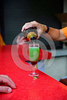 Tasting of sparkling white wine with bubbles champagne on summer festival route of champagne in Cote des Bar, Champagne region,