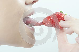tasting strawberry