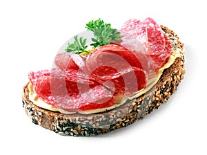 Tasty appetizer of salami on wholewheat bread