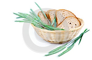 Tasty baked bread with ears of wheat