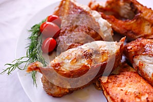 Tasty baked fish with cherry tomatoes and fresh