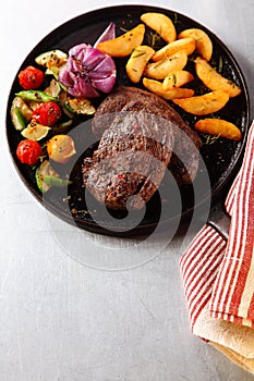 Tasty Beef Steak with Grilled Veggies on Skillet