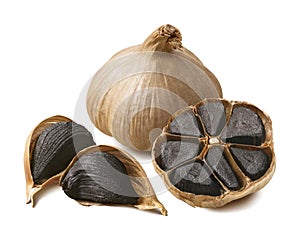 Tasty black garlic isolated on white background photo