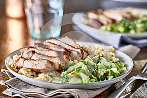 Tasty blackened pork with tomatillo salsa and barley photo