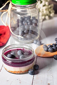 Tasty blueberry cheesecake with fresh sweet blueberries