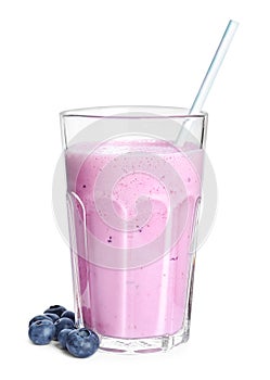 Tasty blueberry milk shake and berries isolated