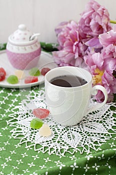 A tasty break: a cup of tea with jelly beans