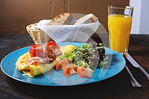 Tasty breakfast. omelet, bread and juice