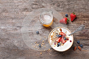 Tasty breakfast with yogurt, berries and granola