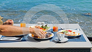 Tasty buffet breakfast served in luxury restaurant with sea view