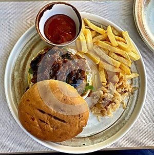 Tasty burger with fri potatos