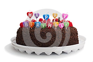 Tasty chocolate cake with happy birthday candles, isolated on white background