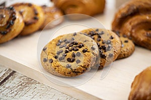 Tasty chocolate cookies on gray table