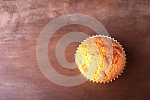 Tasty chocolate cupcakes, muffins on a white wooden table