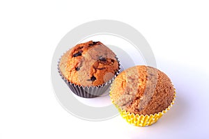 Tasty chocolate cupcakes, muffins on a white wooden table