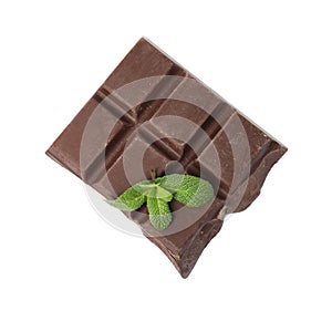 Tasty chocolate piece with mint on white background, top view