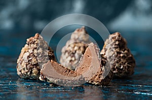 Tasty chocolates wafer crumbs sliced into slices, half and general closeup side view and top