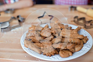 Tasty Christmas cookies on plate during winter