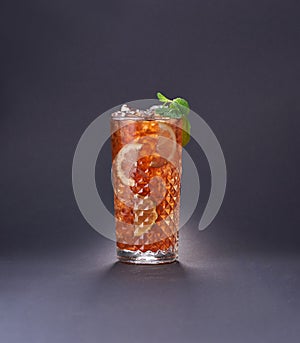 Tasty cocktail on dark background